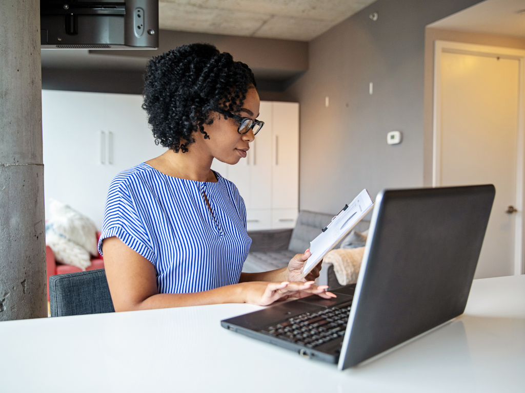 woman in IT working on a laptop